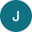 White letter J centered on teal circular background.