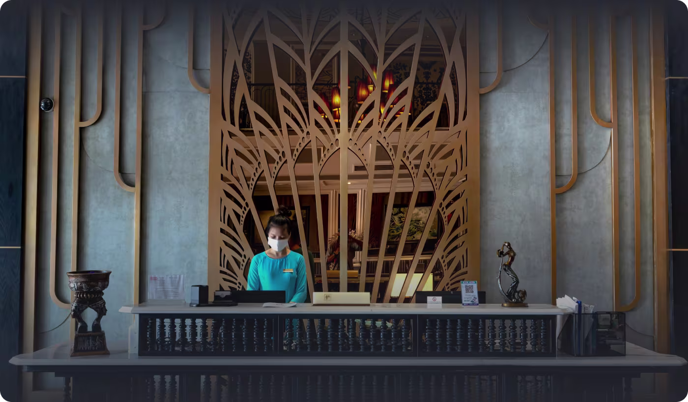 Codeair Software Solutions brand identity applied to Dhaka Regency hotel staff uniforms and luxury keycards with gold star logo design for five-star resort in Bangladesh